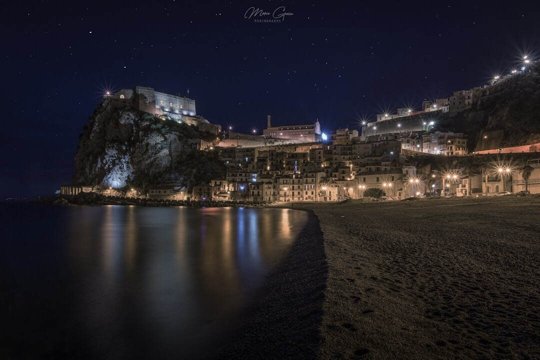 foggy coastal town at night